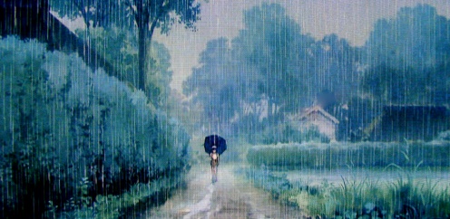 Girl standing in the rain