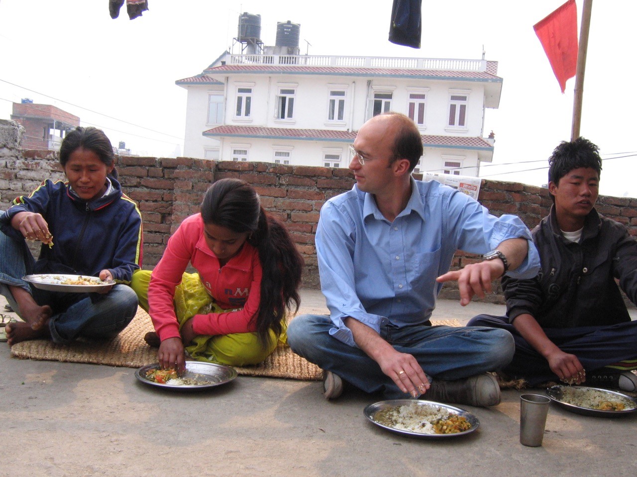 Dan Hirslund with locals